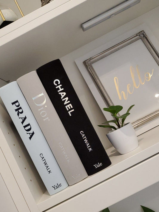 Luxury decorative fashion books on shelf